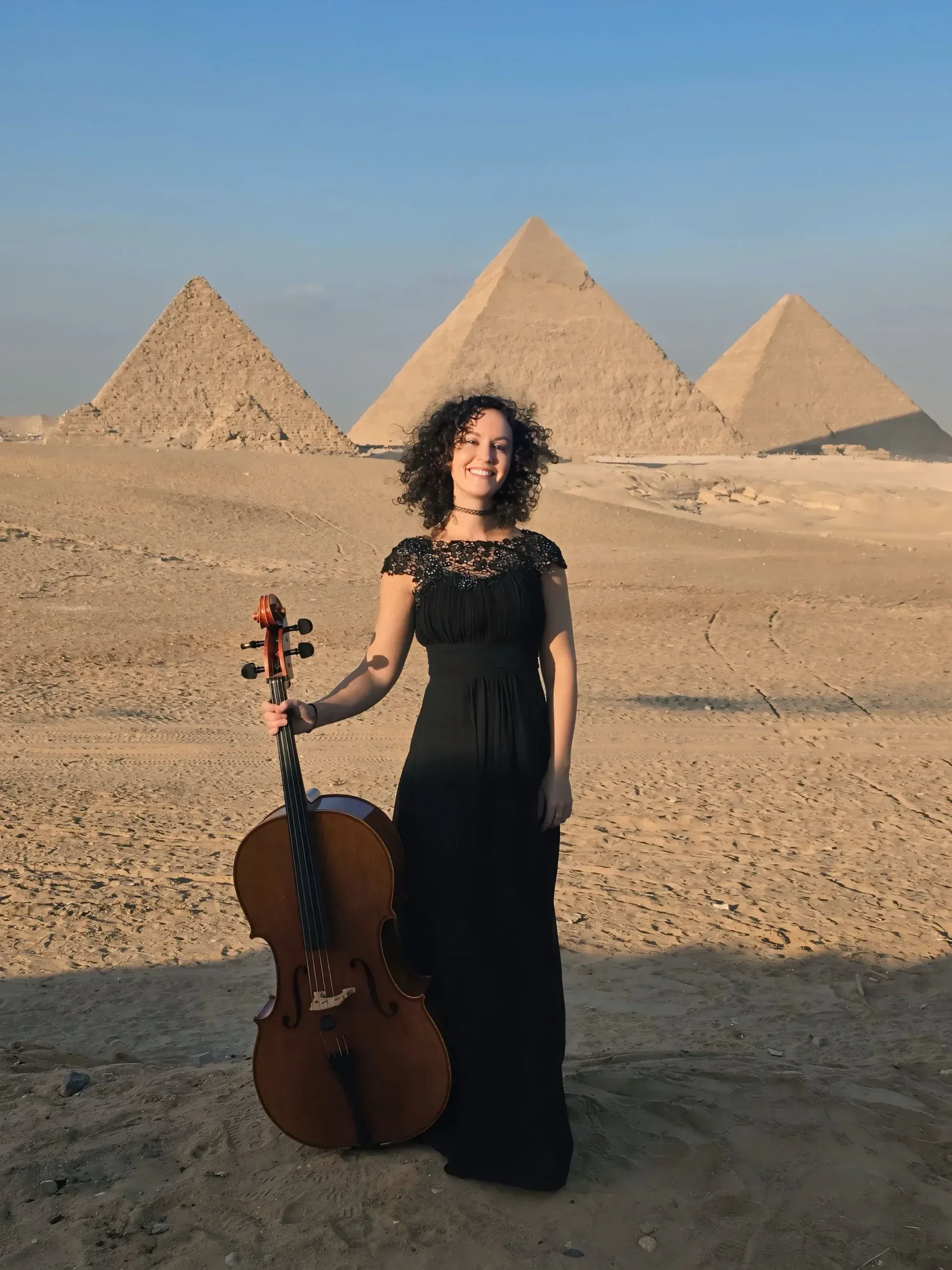 hire a cellist or violinist for world music